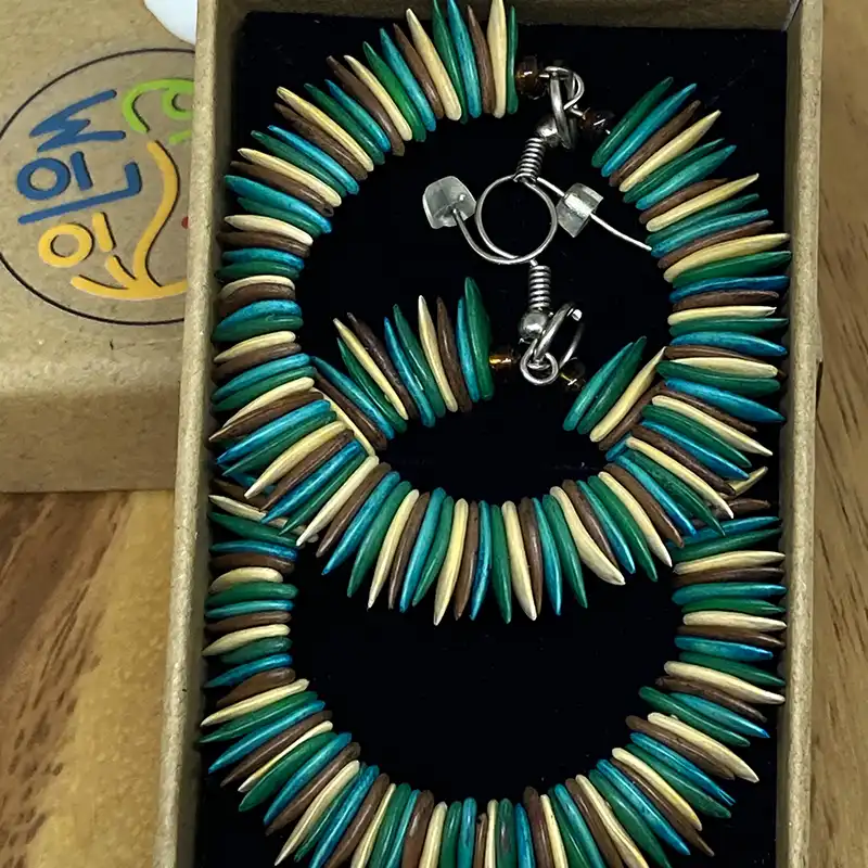 handcrafted artisan melon seed earrings